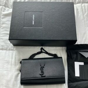 YSL Kate medium in graine de poudre embossed leather in black